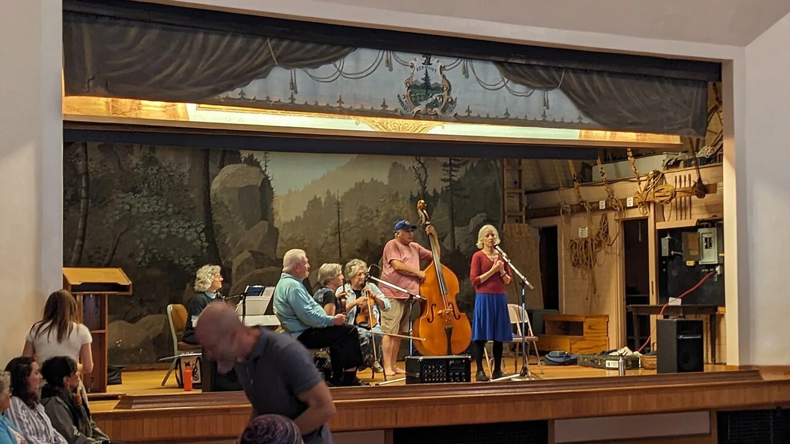 Musicians and guests at a community square dance